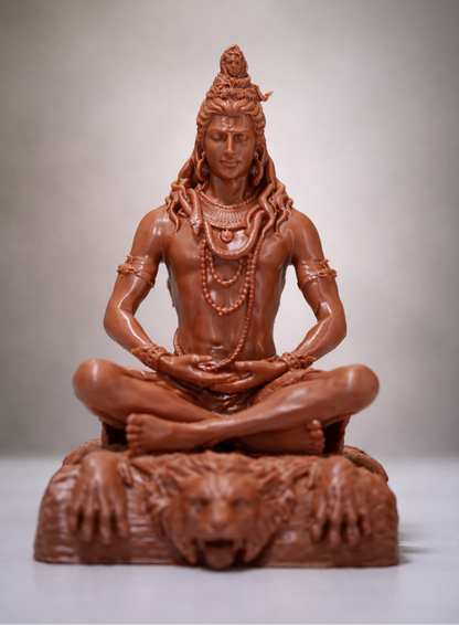 The Lord Shiva Meditation Statue - 6.5 Inch Spiritual Energy Symbol features Shiva cross-legged on a lion-faced base, adorned with necklaces and a snake—an ideal addition to your home temple for spiritual decor.