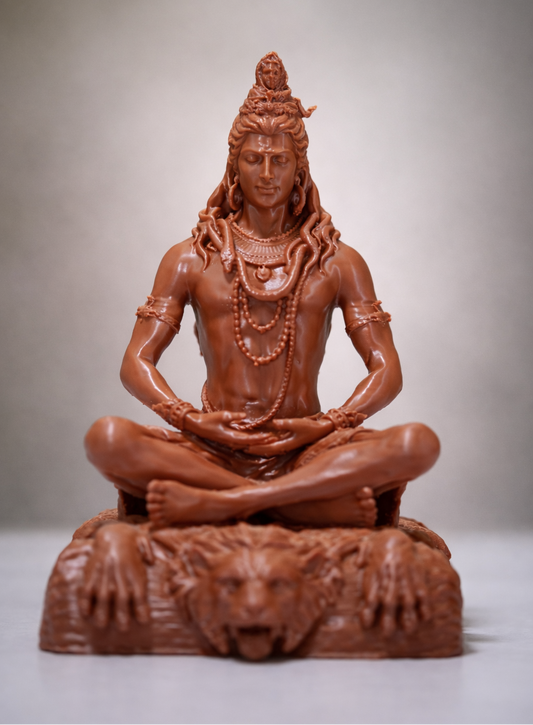 The Lord Shiva Meditation Statue - 6.5 Inch Spiritual Energy Symbol features Shiva cross-legged on a lion-faced base, adorned with necklaces and a snake—an ideal addition to your home temple for spiritual decor.